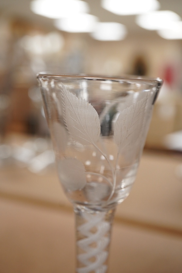 Two 18th century DSOT cordial glasses, one bowl engraved with roses, the other with swag decoration, tallest 16.5cm